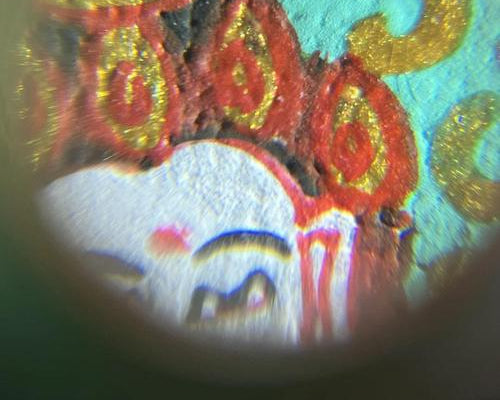 Hand-painted Thangka zoom detail photo, showing exquisite brushwork and color layers