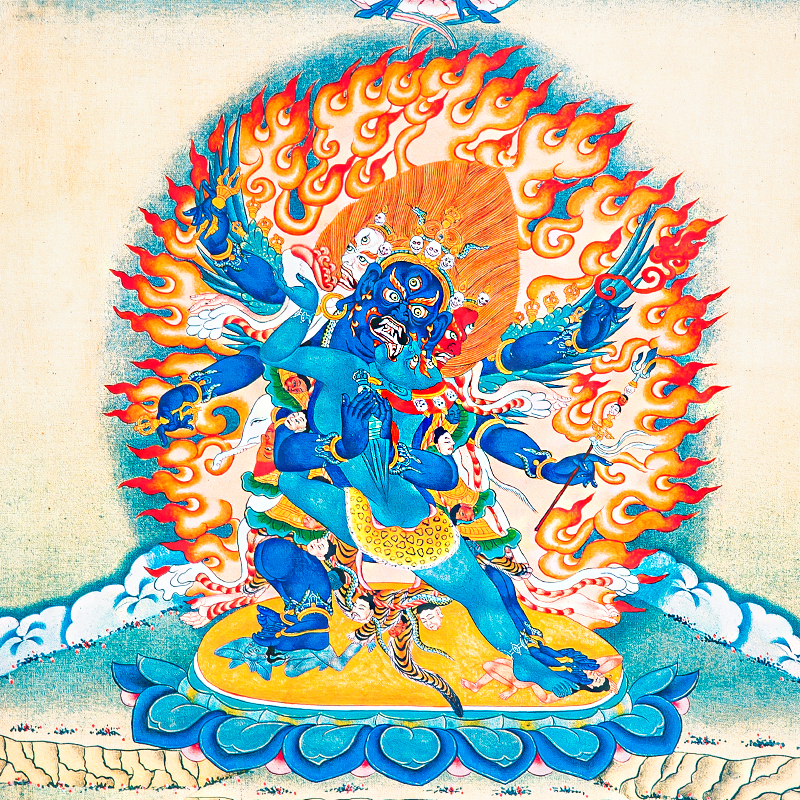 Close-up detail of hand-painted Thangka of Phurba Vajra, Tibetan Buddhist protector